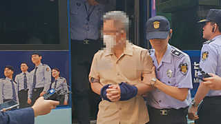'검찰 소환 거부' 드루킹 특검서 세 번째 조사