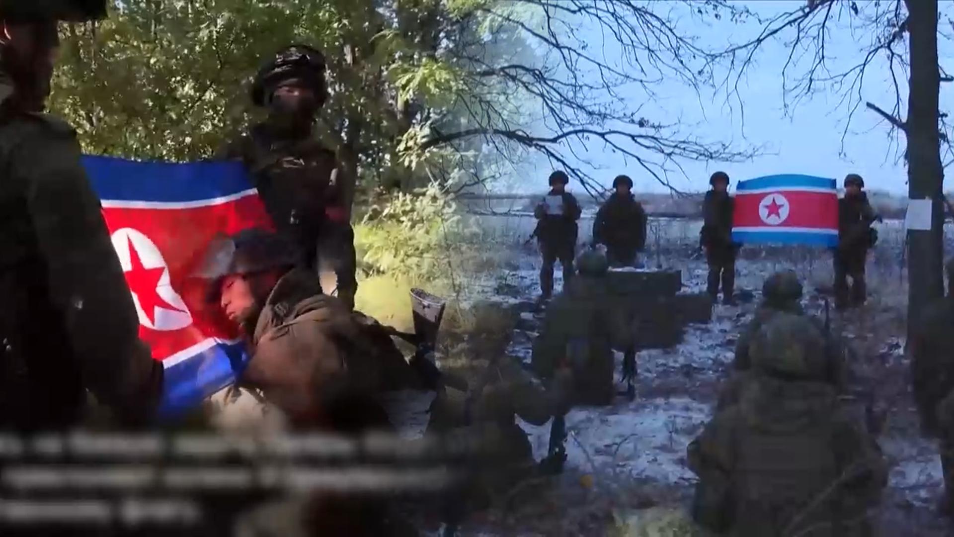 인공기 앞 무릎 꿇은 온라인카지노 경찰 벳엔드군…러시아 '지뢰 제거'에 투입